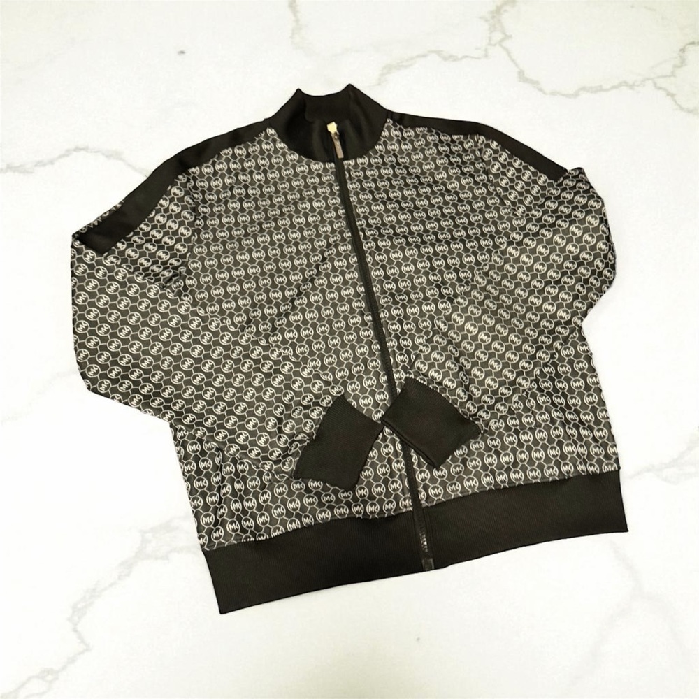Black and white MK logo track suit.